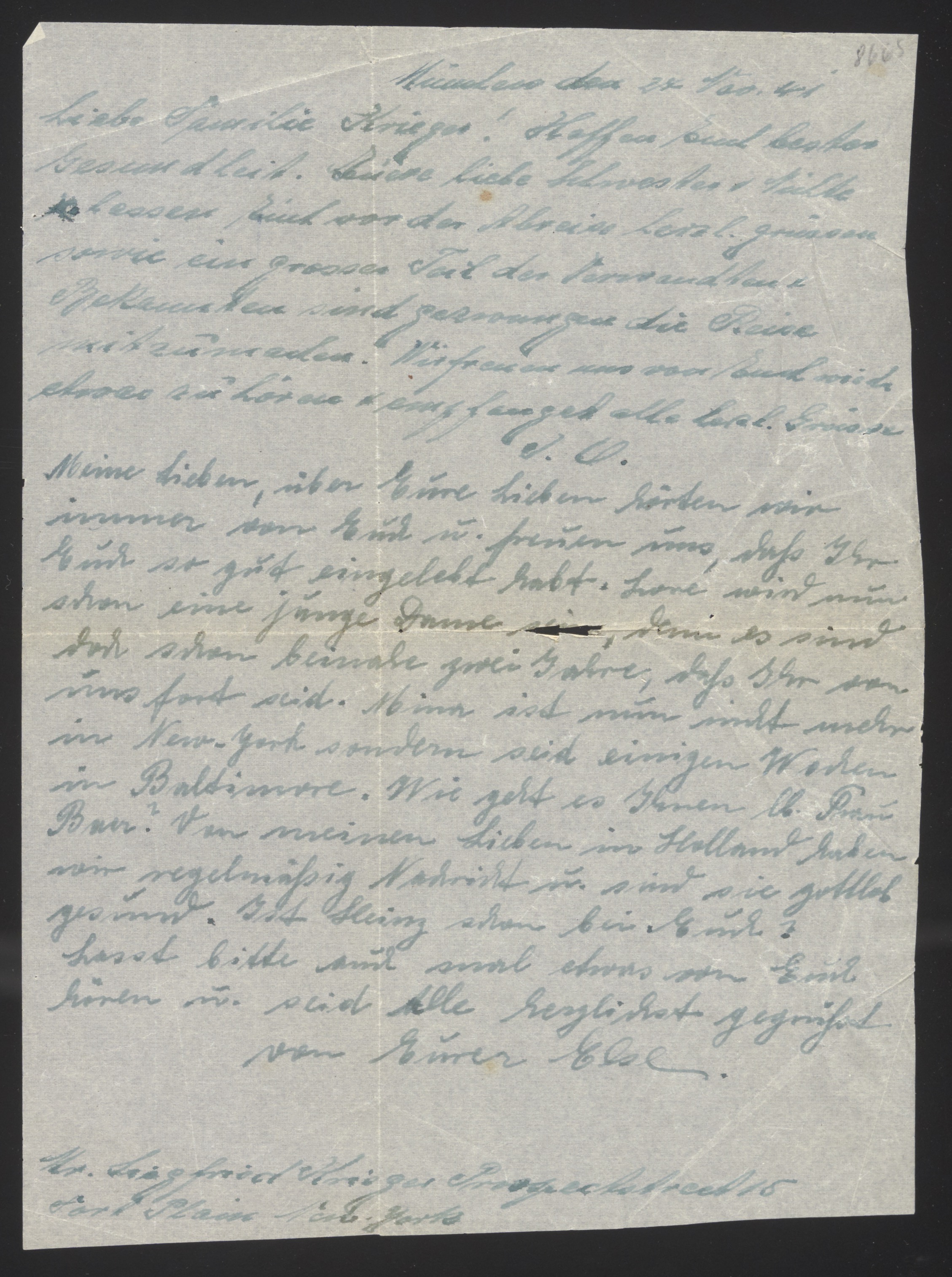 Handwritten letter on blue/green paper — Document