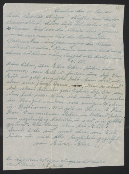 Handwritten letter on blue/green paper