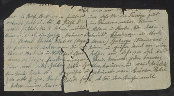 Handwritten letter fragment (partial page, damaged/torn)